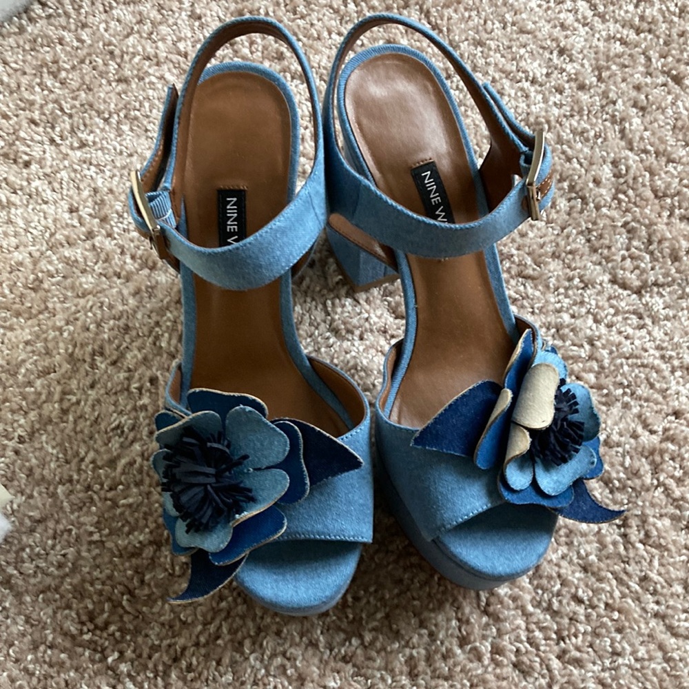 Beautiful blue high heels with a beautiful flower on it
